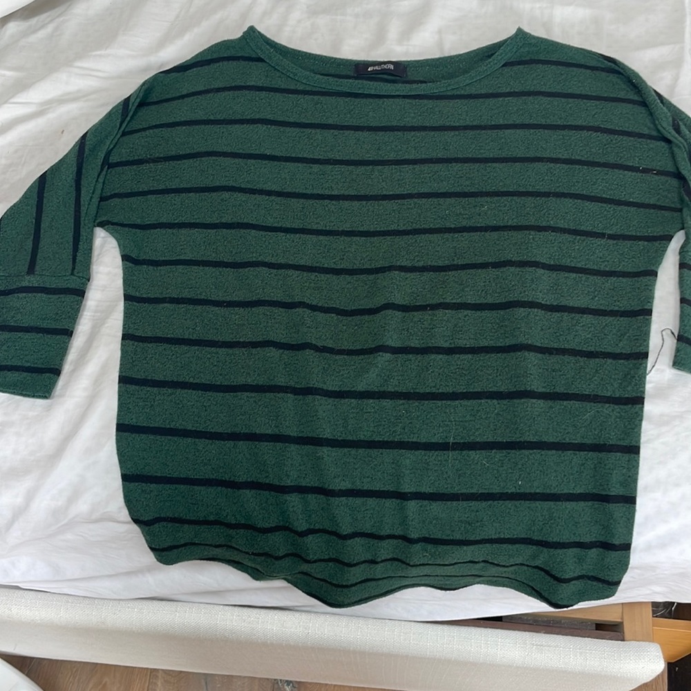 Green sweater with black stripes